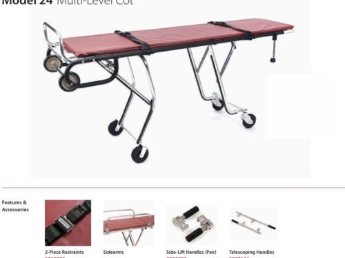 Model 24 Multi-Level Cot: red-padded patient cot on a folding wheeled frame with adjustable height.